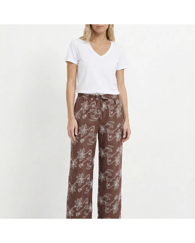 Pantalon large avec sérigraphies fleurs